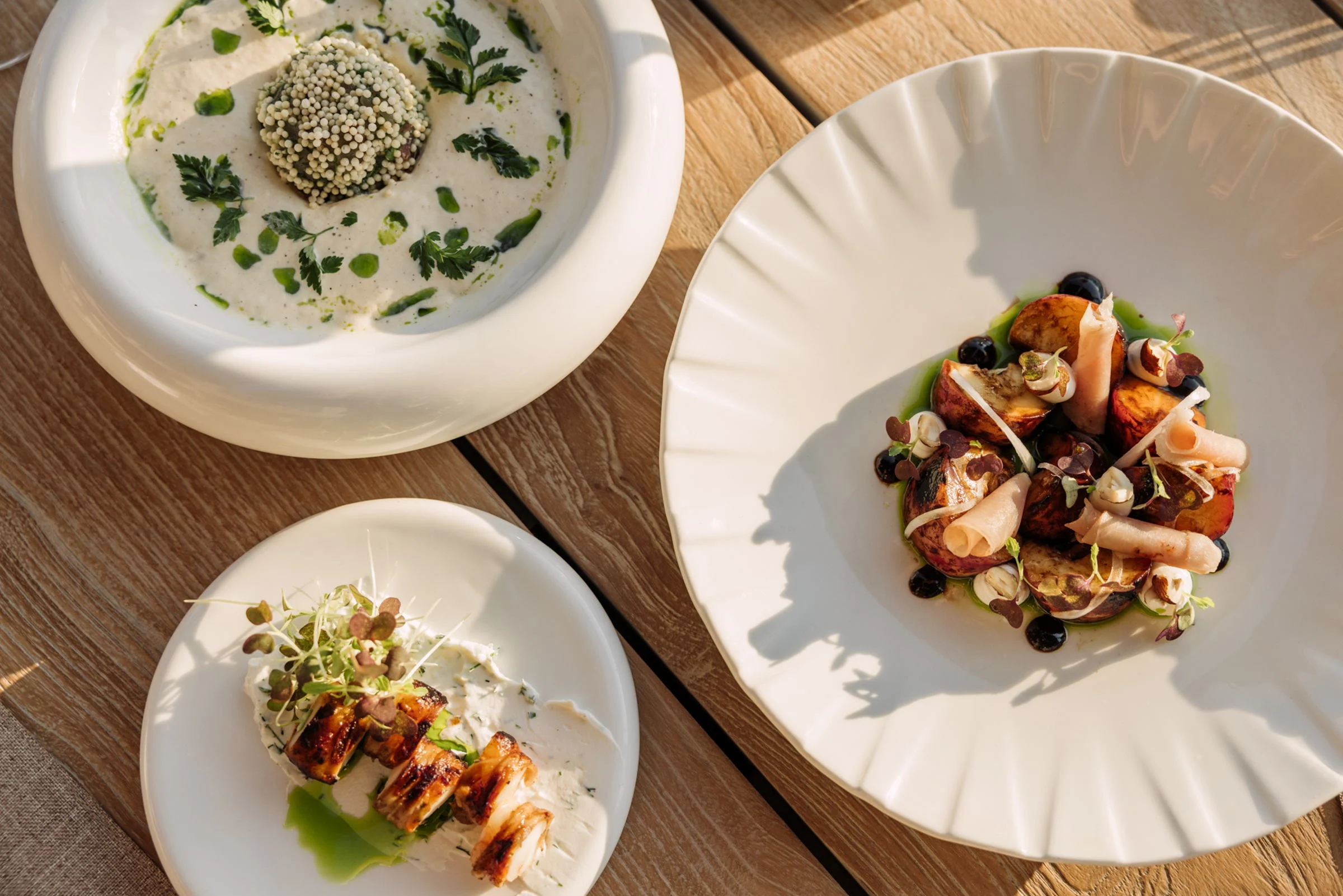 Small plates on a sunlit table
